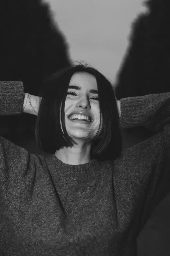 Woman laughing black white close up joy Paris