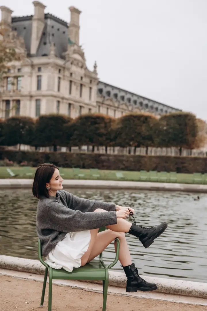 Woman sitting by pond Tuileries Louvre Paris portrait